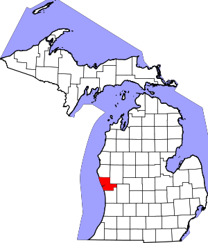 A map of the State of Michigan with Muskegon County highlighted in red.